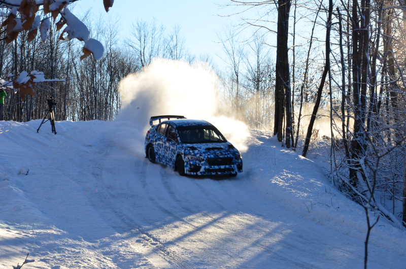 Illustration for article titled Watch The 2015 Subaru WRX STI Rally Car Catch Air Sideways
